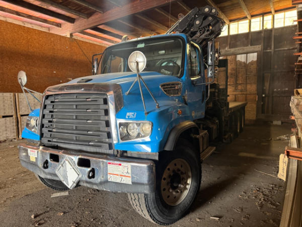 Photo of a 2014 Freightliner 114SD